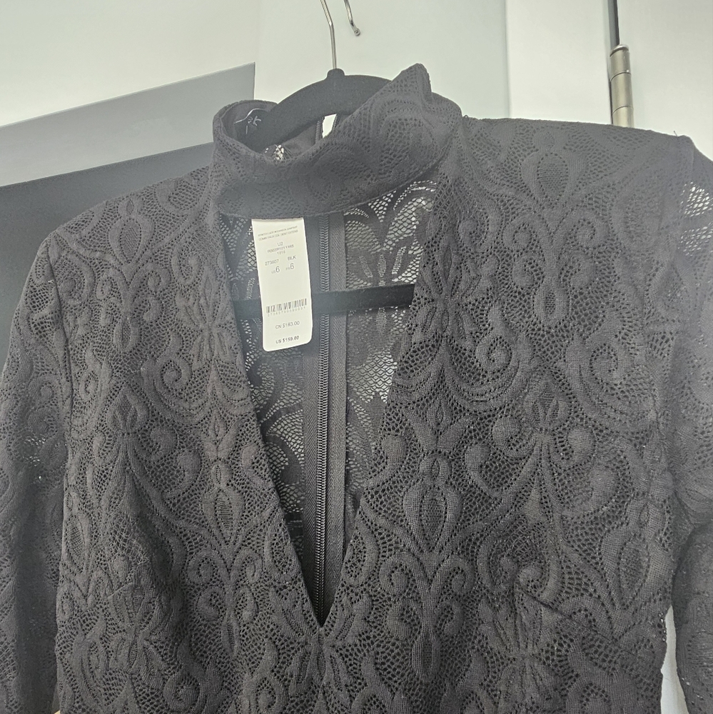 Chic Bebe lace jumpsuit- black new with tags. Size 6